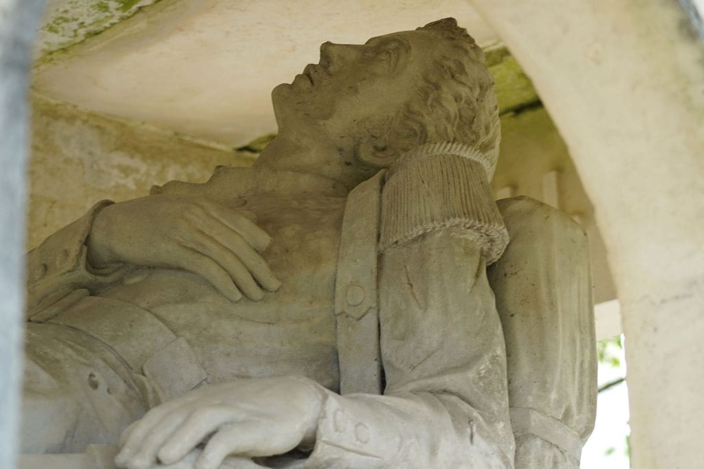 The statue of the Gisant near the temple of Saint-Augustin-sur-Mer